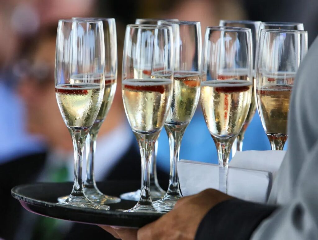 Champagne is served. (Joe Burbank/Orlando Sentinel) 3082752